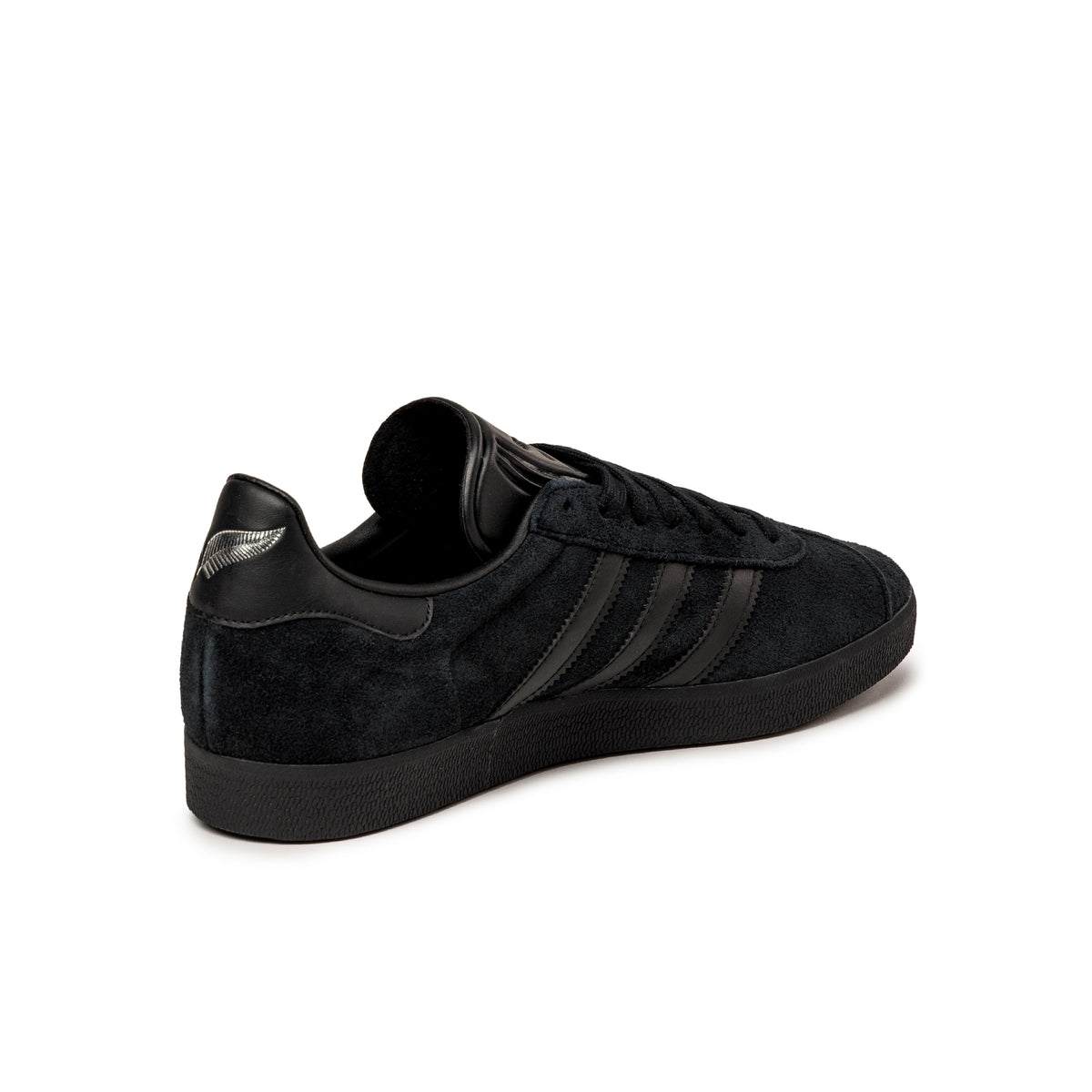 All black low top adidas online