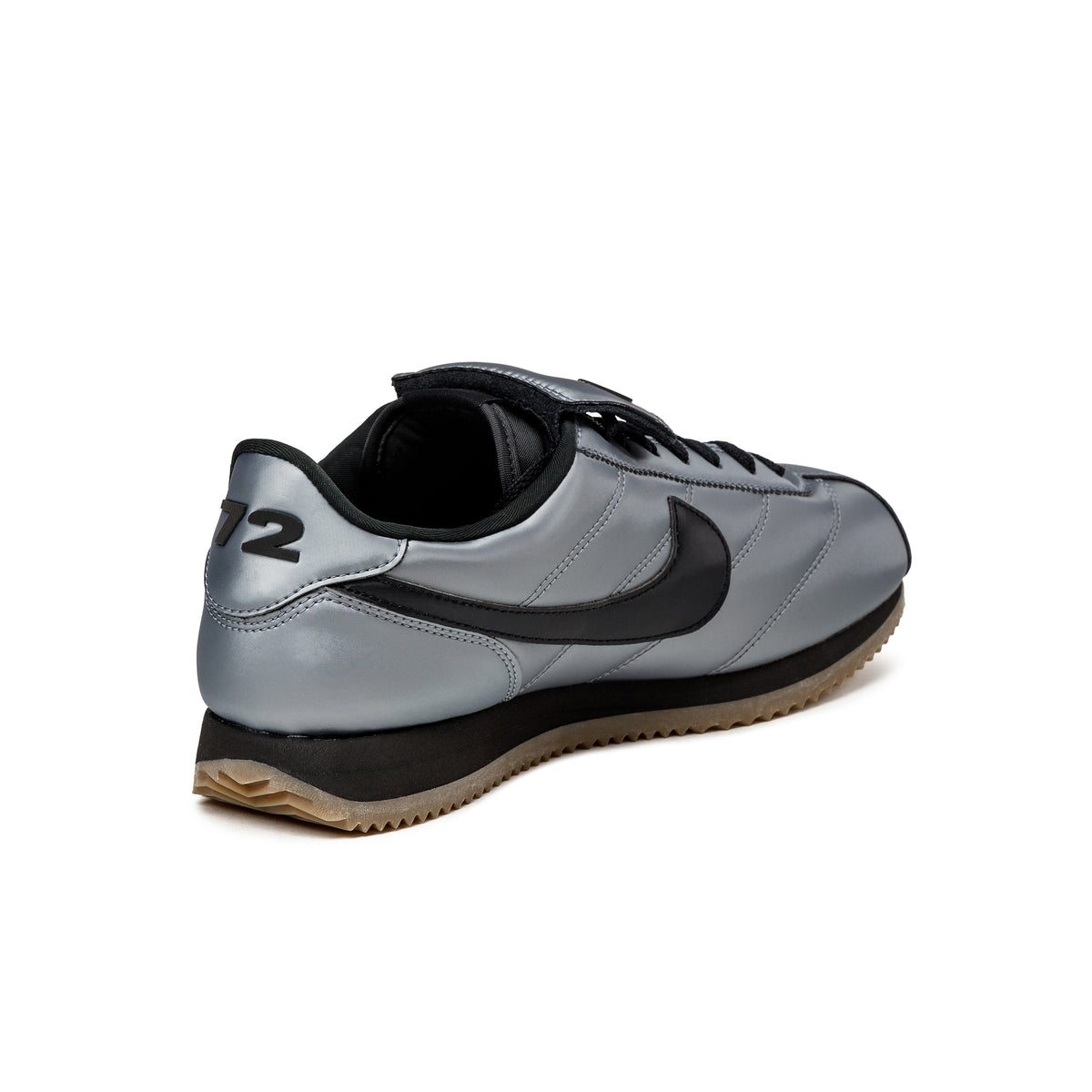 Black and silver nike cortez on sale