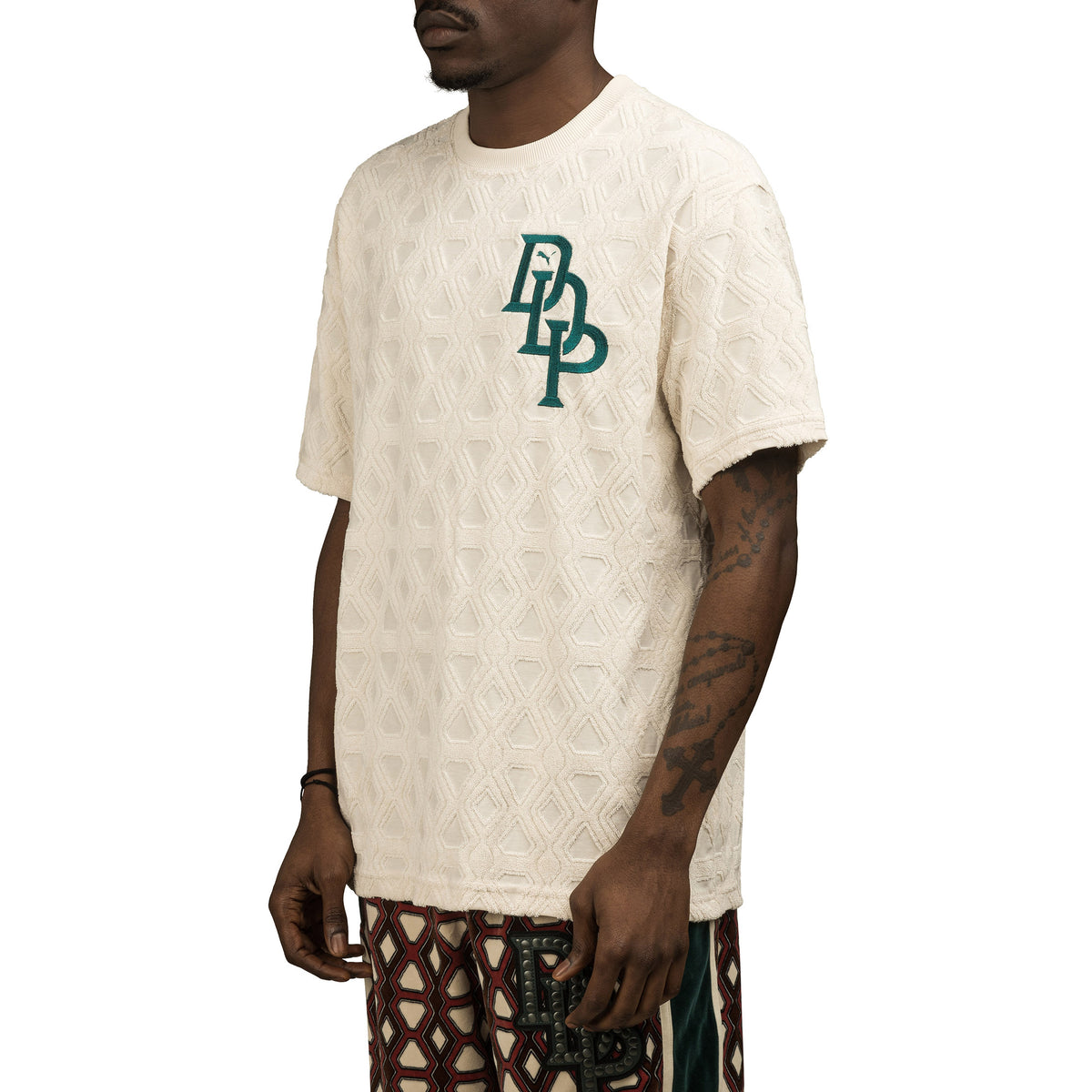 Puma x Dapper Dan – Jacquard Logo Tee Beige