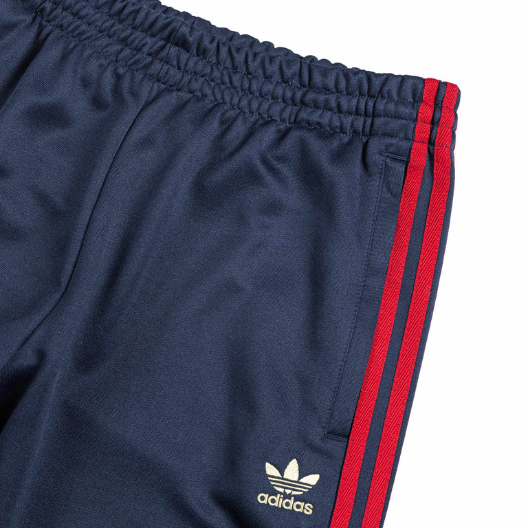 Adidas originals europa track pant in navy hotsell