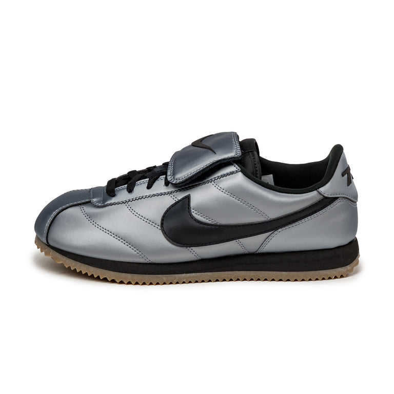 Nike cortez damen schwarz gold online