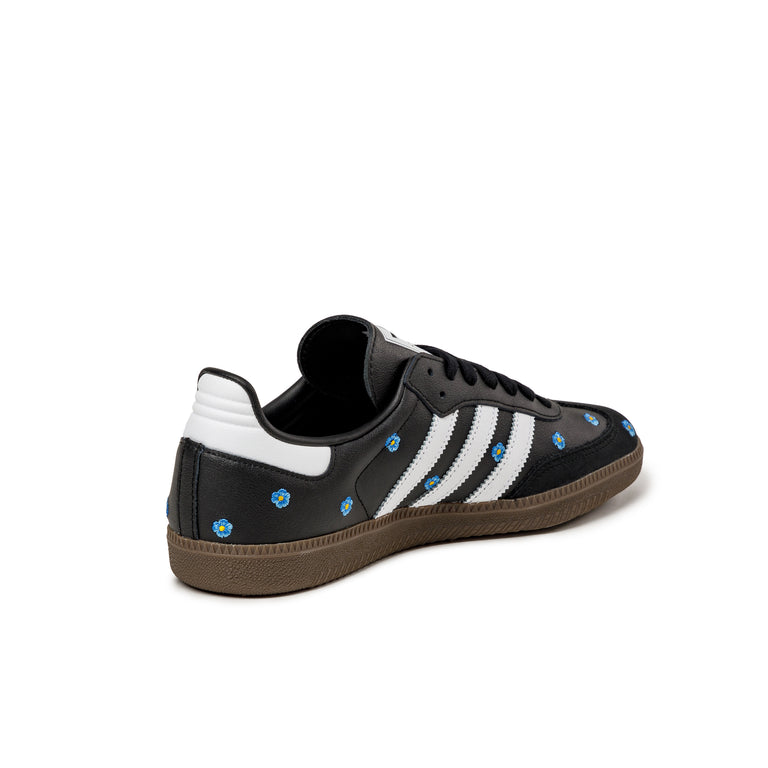 Adidas noir avec fleur hotsell